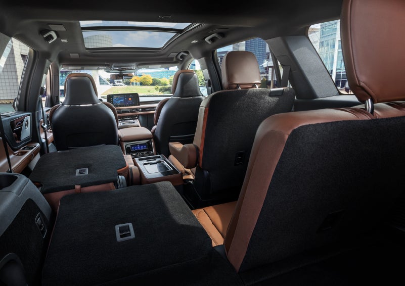 The interior of the 2025 Lincoln Aviator® SUV is shown with two seats folded down for added space. | Lincoln of Wayne in Wayne NJ