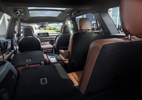 The interior of the 2025 Lincoln Aviator® SUV is shown with two seats folded down for added space. | Lincoln of Wayne in Wayne NJ
