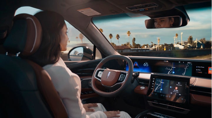 A person is shown driving hands-free on the highway with available Lincoln BlueCruise technology. | Lincoln of Wayne in Wayne NJ