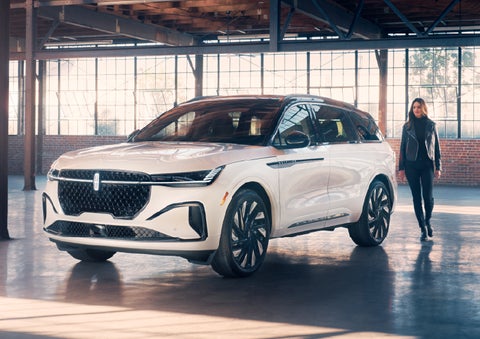 A person approaches a 2025 Lincoln Nautilus® SUV. | Lincoln of Wayne in Wayne NJ
