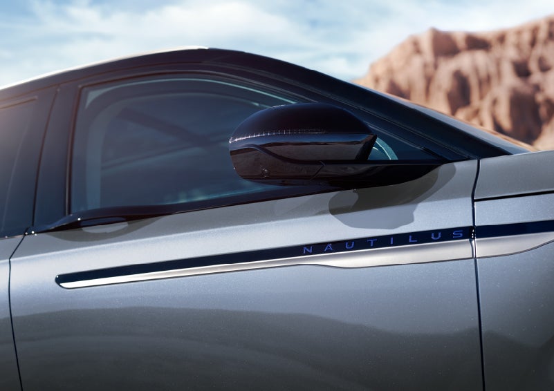 Blue lettering on the side of the vehicle that reads nautilus indicates the available hybrid powertrain. | Lincoln of Wayne in Wayne NJ