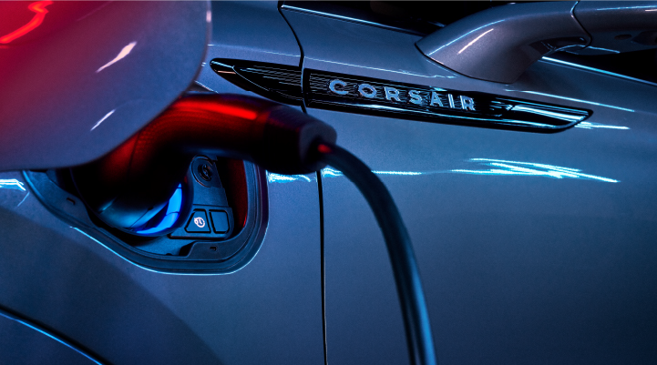 A charger plugged into the charging port of a 2025 Lincoln Corsair® Plug-in Hybrid model. | Lincoln of Wayne in Wayne NJ