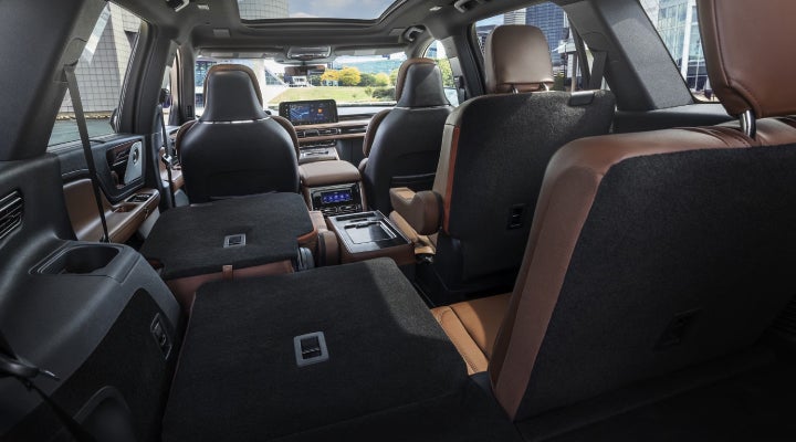 One side of the PowerFold® third-row seat and a second-row seat are folded forward in the 2026 Lincoln Aviator® SUV. | Lincoln of Wayne in Wayne NJ