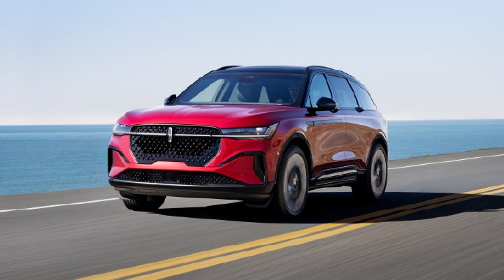 A 2026 Lincoln Nautilus® SUV is being driven on a seaside roadway. | Lincoln of Wayne in Wayne NJ