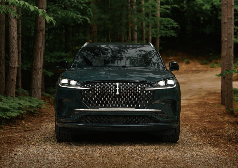 The front grille of a 2027 Lincoln Aviator® Black Label™ SUV is shown. | Lincoln of Wayne in Wayne NJ
